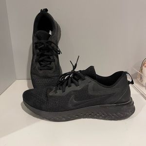 All black Nike shoes
